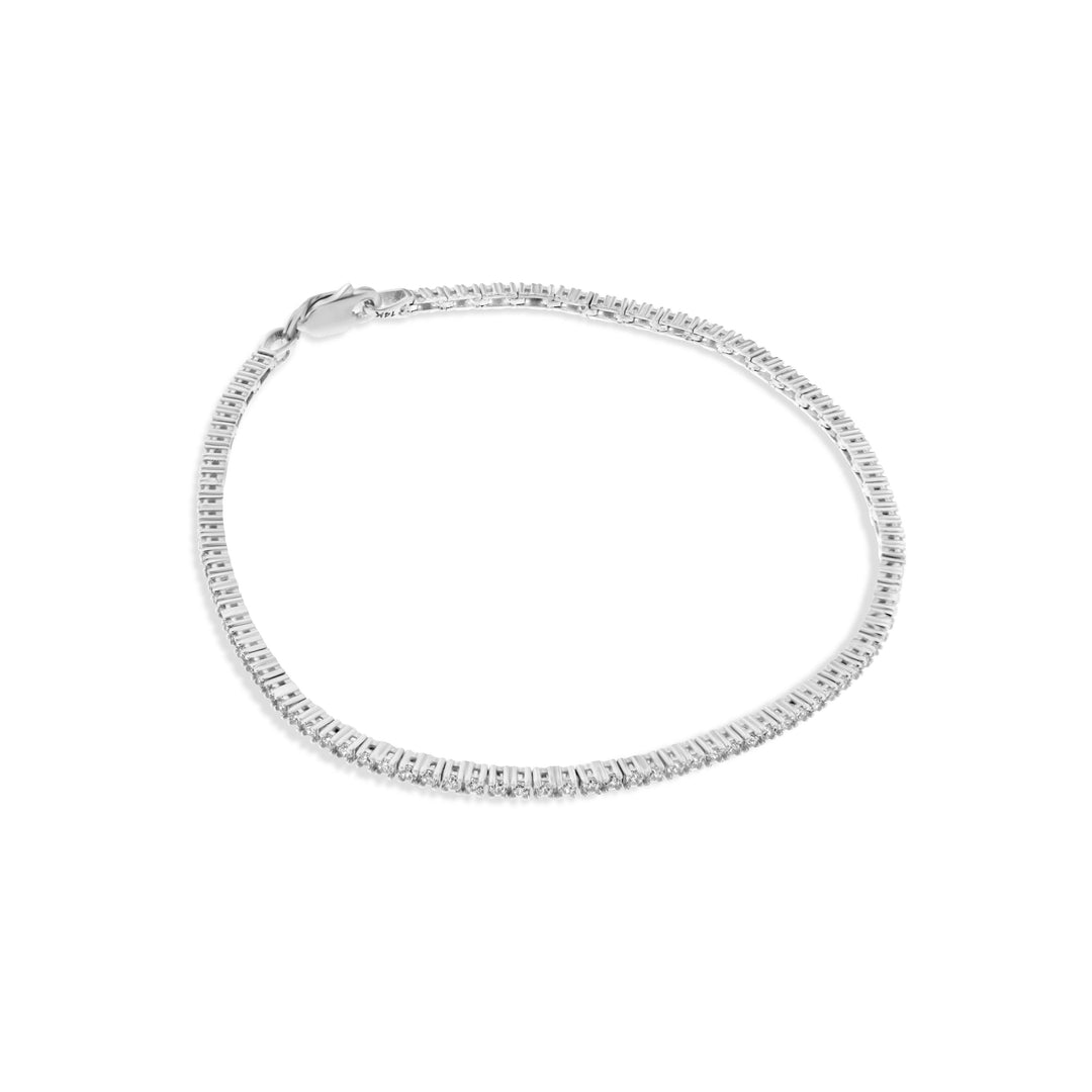 צמיד טניס עדין מזהב לבן 14 קראט משובץ אבנים