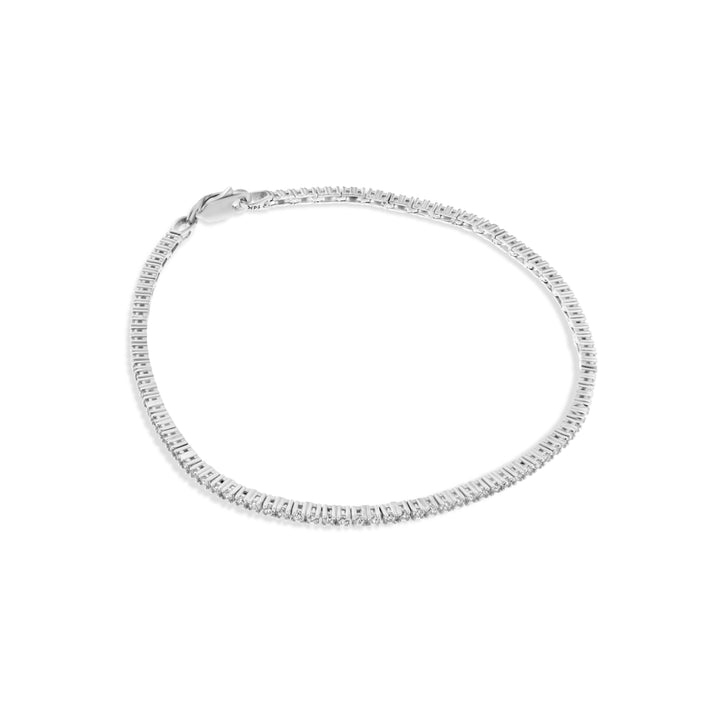 צמיד טניס עדין מזהב לבן 14 קראט משובץ אבנים